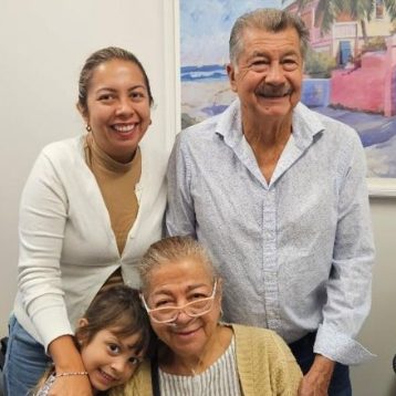 Nancy and her family at the CRC office, collecting a donated portable oxygen concentrator